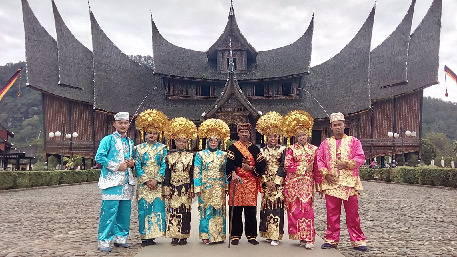 Visitors in Traditional Minangkabau Dress at Istano Basa Pagaruyung